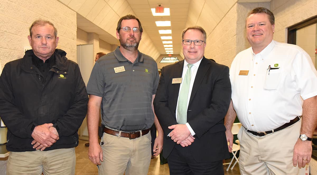 Shown above (l to r) are South Georgia Technical College John Deere Tech instructors Wayne Peck and Matthew Burks along with SGTC Vice President for Academic Affairs David Kuipers and John Deere Division Customer Support Manager Bob Cunningham who welcomed the students, parents and dealers to the open house.