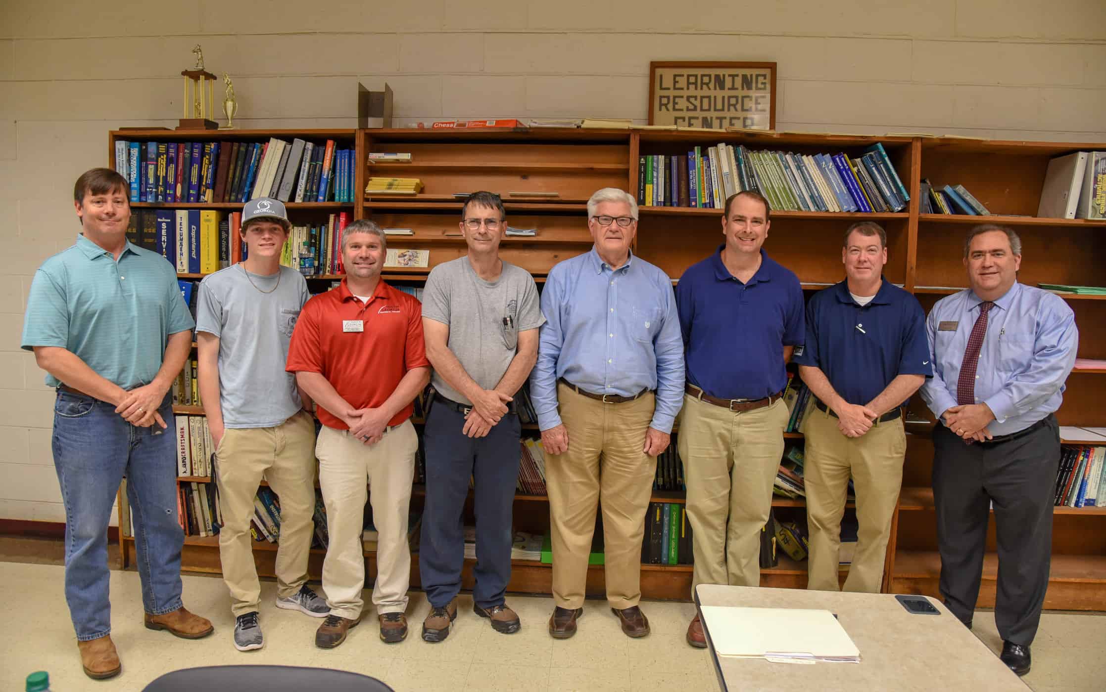 Advisory committee members (l to r) John Hayes, Caleb Abell, Brian McDowell, Paul Battle, Raymond Holt, Glynn Cobb, Brian McMichael and Paul Farr stand together.