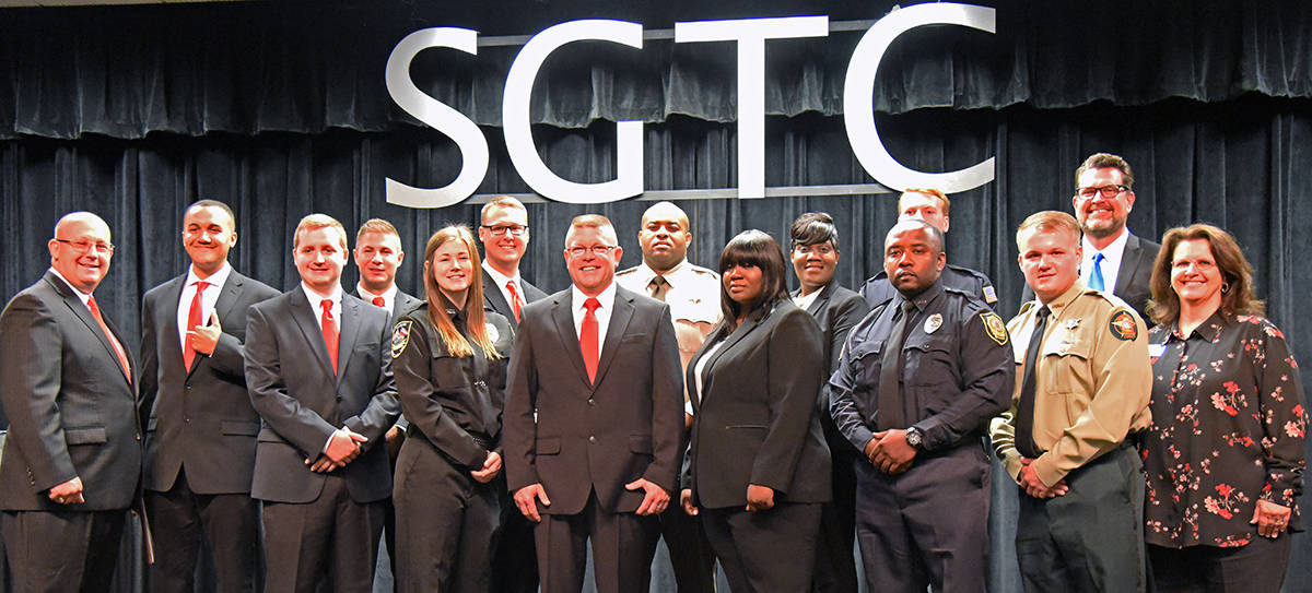 South Georgia Technical College President Dr. John Watford, LEA Academy Director Brett Murray and Academic Dean Vanessa Wall are shown above with the members of the SGTC Law Enforcement Academy 10th anniversary class 19-01. Cadets included: Corey Stephen Brown of Leesburg, Shuntuta Brown of Lumpkin, Bradley Wayne Clayton of Vienna, April Cosby of Marshallville, Hunter Cole Fallin of Leesburg, Justin Scott Flowers of Trotman, Michael Chase Francis of Smithville, Heather Gartman of Tifton, Joshua Peyton Merritt of Cuthbert, Eric Rutherford of Americus, Bradley Dion Small of Americus and Travis Jackson Turner of Cordele.