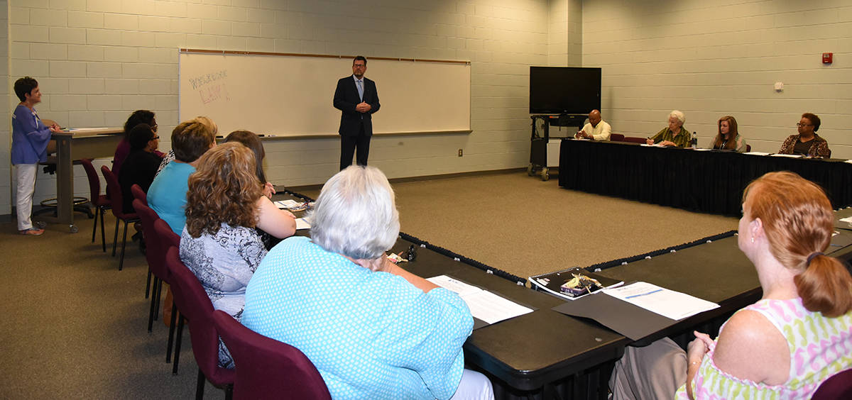 South Georgia Technical College President Dr. John Watford is shown above greeting the individuals to the SGTC Adult Education advisory meeting recently. Adult Education Dean Lillie Ann Winn is also shown (left standing).