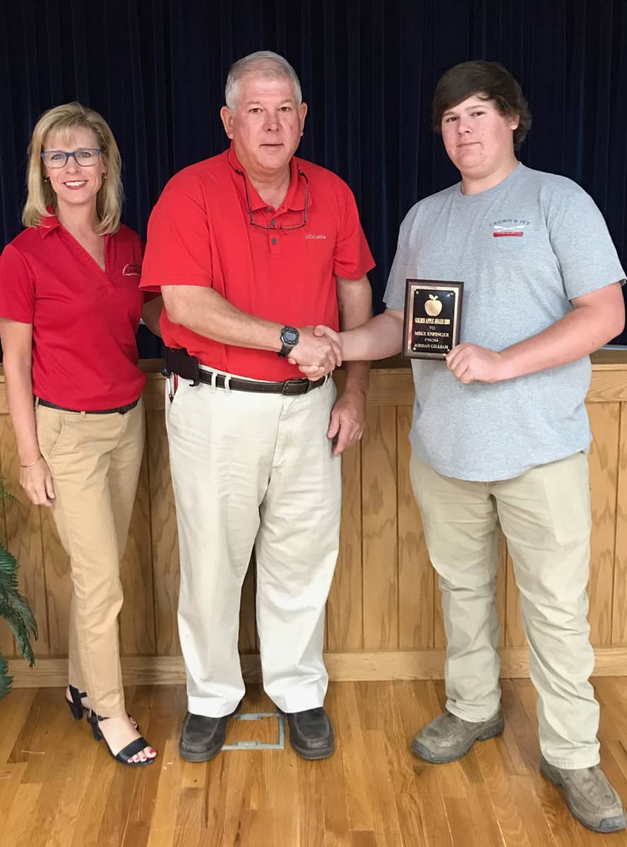 South Georgia Technical College Dean of Enrollment Management on the Crisp County Center Julie Partain is shown above (l to r) with SGTC Crisp County Electrical System’s Instructor Mike Enfinger and Jordan Gilliam, who nominated Enfinger for the award from the Crisp County School System.