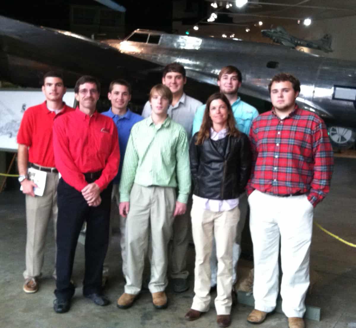 Mike Cochran is shown above with a group of his former students. This was one of the last field trips that he took with students before his retirement in 2012.