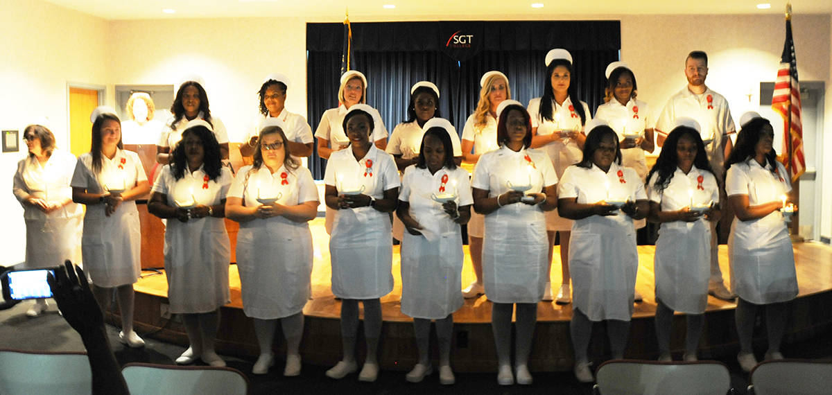 Shown above are the SGTC Crisp County Center Practical Nursing graduates during the Lighting of the Candles during the traditional pinning ceremony on the Crisp County Center.