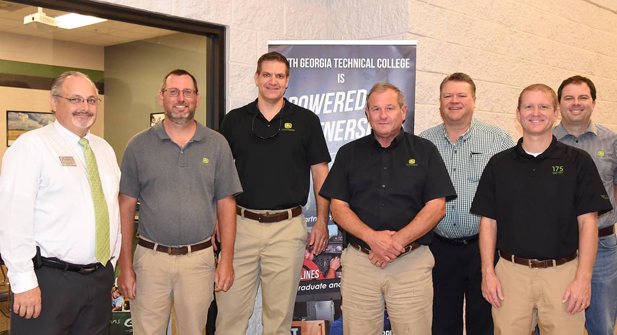 Shown above are South Georgia Technical College Academic Dean Dr. David Finley, SGTC John Deere Tech instructor Matthew Burks, Dave Bostic, John Deere Territory Customer Support Manager (TCSM) South East Mississippi, South Alabama, and West Georgia for Flint Ag, SunSouth, and Smith Tractor; SGTC Instructor Wayne Peck, John Deere Division Customer Support Manager for the Eastern Region – Agricultural and Turf Division Bob Cunningham; John Deere Territory Customer Support Manager (TCSM) for South Georgia and North Florida for Lasseter and Ag Pro Company Bob Long; and John Arthur, John Deere Production System Manager, Global Property Care from Cary, NC.