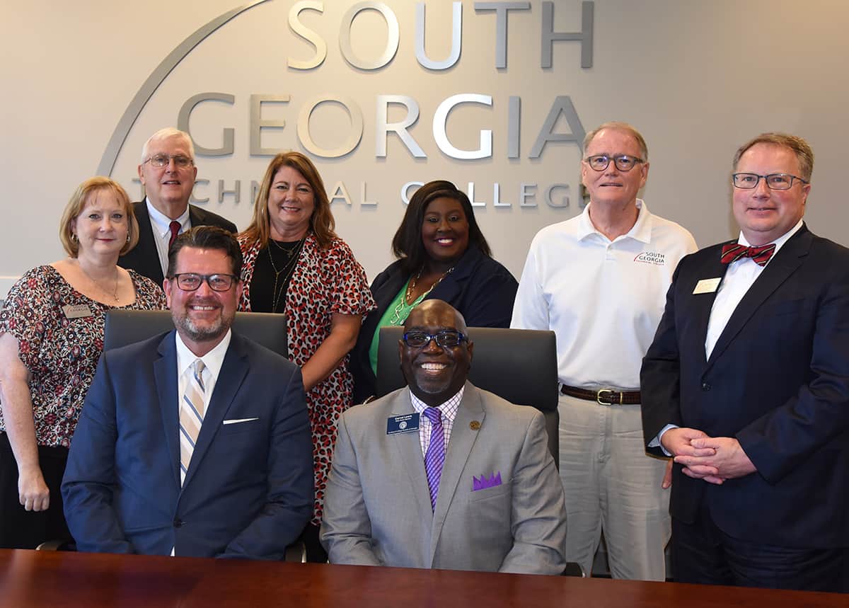 South Georgia Technical College President Dr. John Watford is shown above seated with TCSG State Board Member Carvel Lewis, who came to visit South Georgia Tech recently. Also shown are SGTC Vice President of Administrative Services Lea Coe, SGTC Vice President of Economic Development Wally Summers, SGTC Vice President of Operations Karen Werling, SGTC Vice President of Student Affairs Eulish Kinchens, Assistant to the President Don Smith, and SGTC Vice President of Academic Affairs Davis Kuipers. Not shown is SGTC Vice President of Institutional Advancement Su Ann Bird.