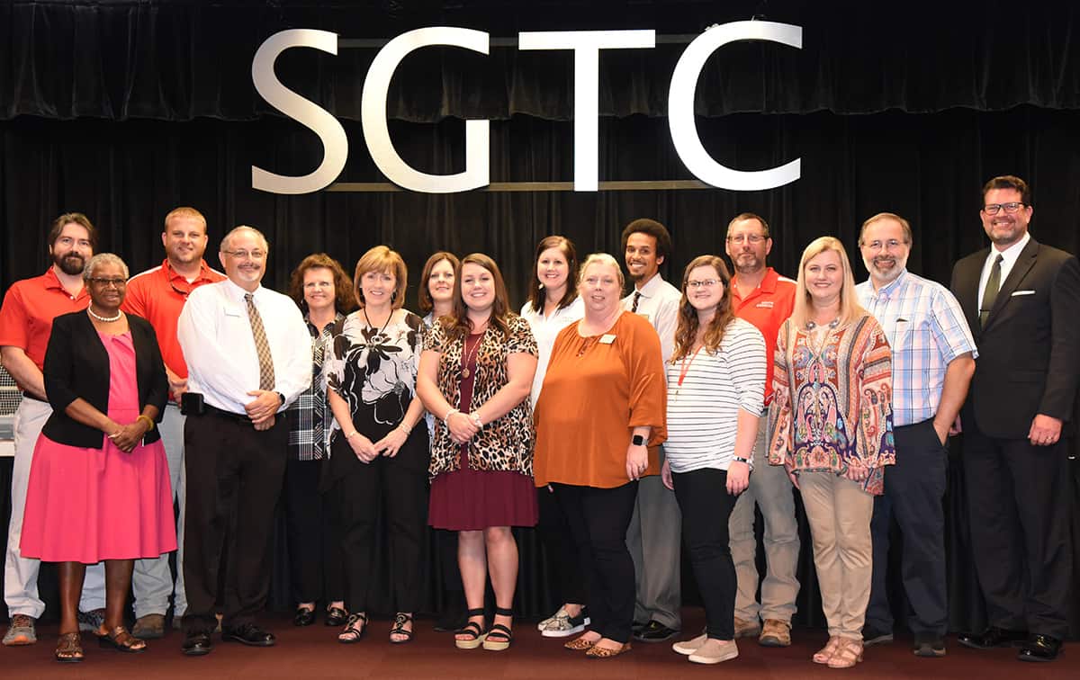 Shown above “Impacting Student Success @ South Georgia Tech!” is the South Georgia Technical College TechForce 2019 Internal Committee who worked so hard to make the internal drive and silent auction such a success. Shown (l to r) are: DW Persall, Minnie Williams, Kyle Hartsfield, David Finley, Vanessa Wall, Tami Blount, Faith Harnum, Beth Brooks, Carrie Wilder, Teresa McCook, Chester Taylor, Leah Cannady, Matthew Burks, Michelle McGowan, and Patrick Peacock are shown above with SGTC President Dr. John Watford. Not shown are: Dr. Andrea Oates, Andrea Ingram, Michele Seay-Small, Gail Clary, Nancy and Paul Fitzgerald, and Hunter Little.