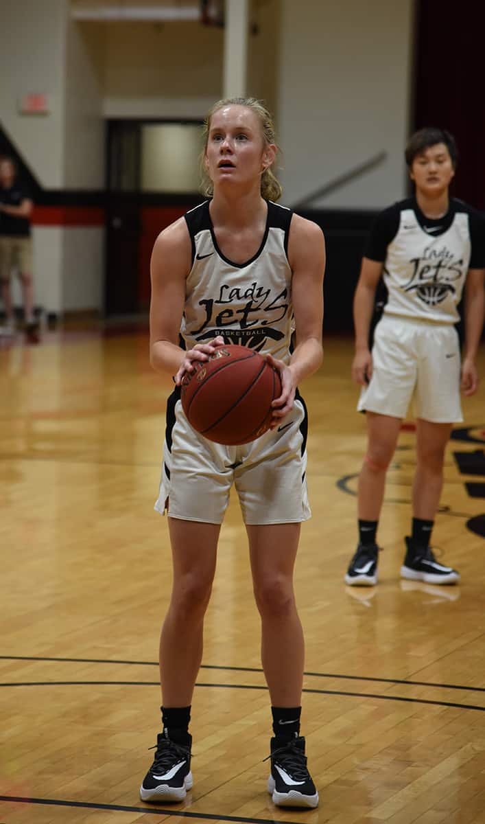 Anna McKendree, 14, returning sophomore guard from Flowery Branch, GA, did a good job of leading the Lady Jets in outside shooting against the Joint Base Landley-Eustis, VA team in a scrimmage recently. She is shown here at the free throw line.