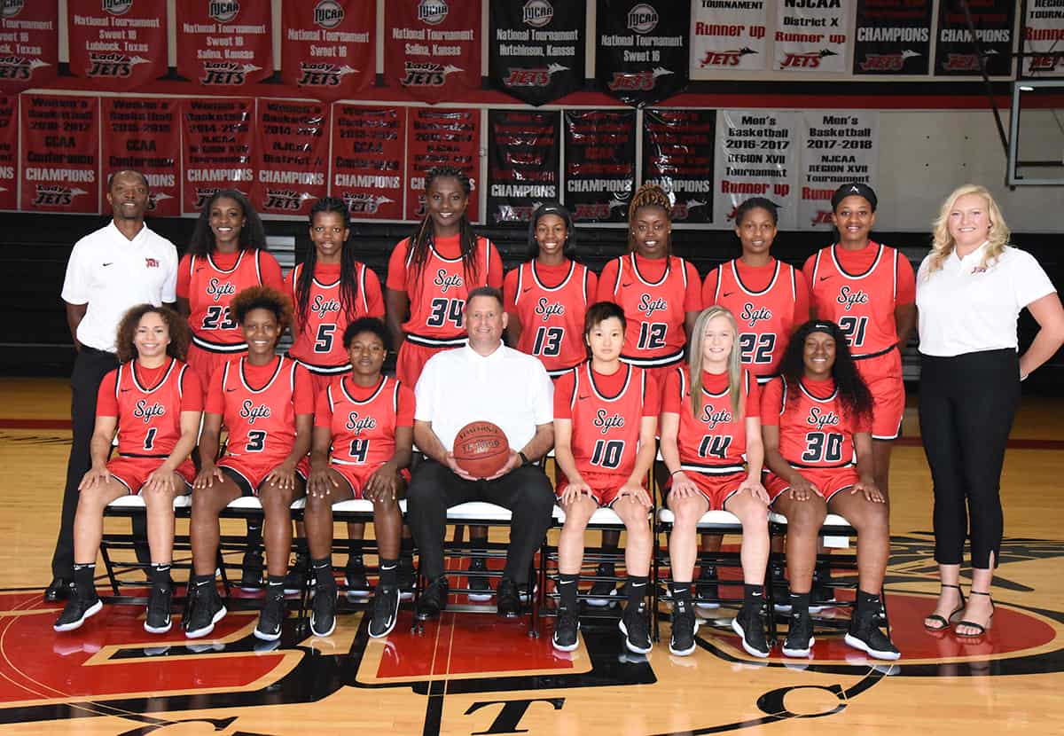 The 2019 – 2020 Lady Jets. Shown (l to r) standing are: Assistant Coach Demetrius Colson, Oumy Gueye, Amara Edeh, Femme Sikuzani, Yasriyyah Wazeerud-Din, Flore Ngasamputu, Sarah Lwambo, Hope Butera, and Assistant Coach Ciarra Edwards. Shown seated are; Shamari Tyson, Niya Goudelock, Veronica Charles, Lady Jets head coach James Frey, Moe Shida, Anna McKendree, and Kamya Hollingshed.