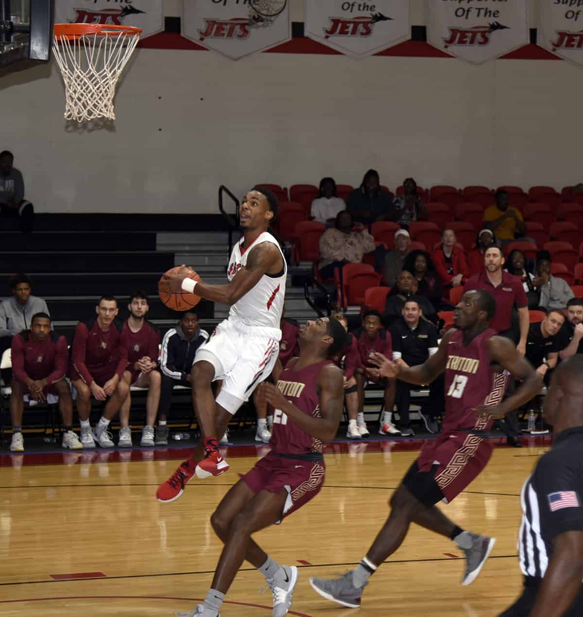 Lamont Sanders drives for a score against Triton College. Sanders led the Jets in scoring for both games in the Pete Arrington Classic.