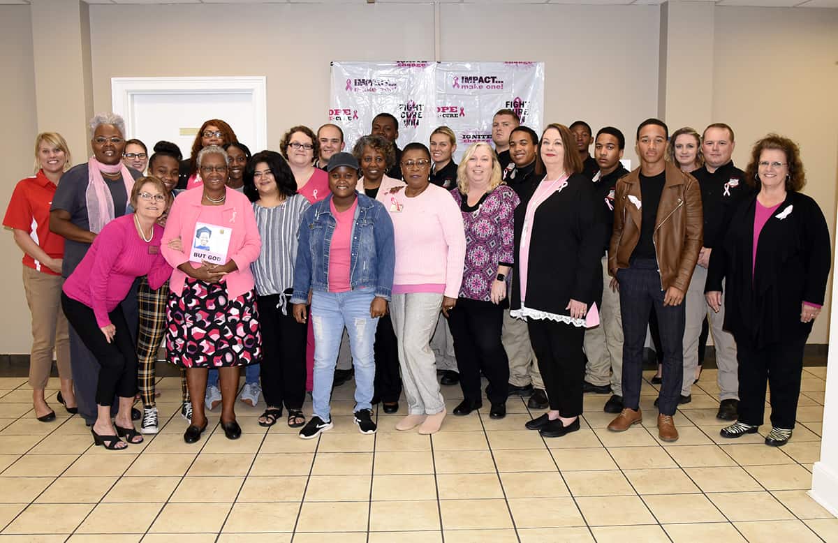 Pictured here are participants in SGTC’s “Penny War” to raise funds in the fight against breast cancer.