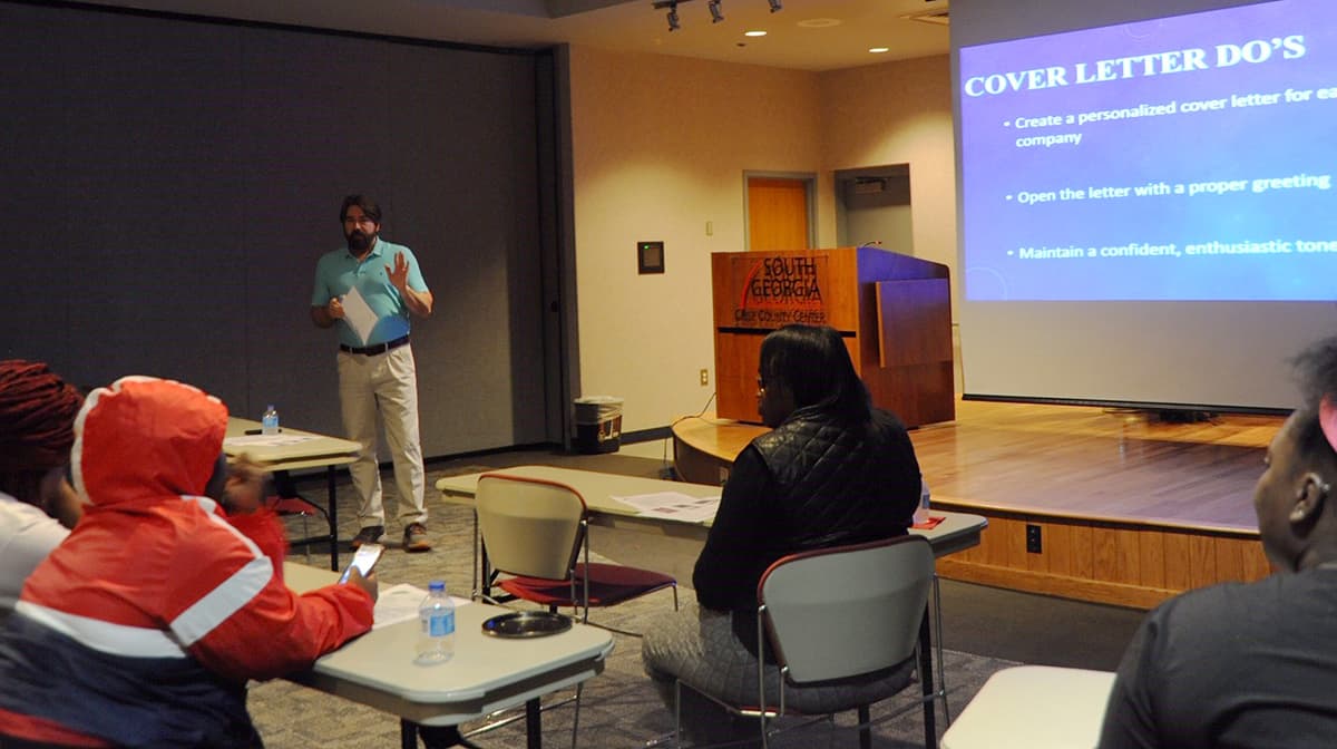 D.W. Persall, Media & Library Services Specialist at the SGTC Crisp County Center, provides students tips on writing a quality cover letter during a recent workshop.