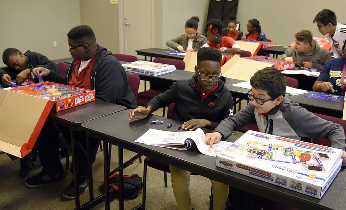 Macon County students build projects with snap circuits on a recent trip to SGTC.