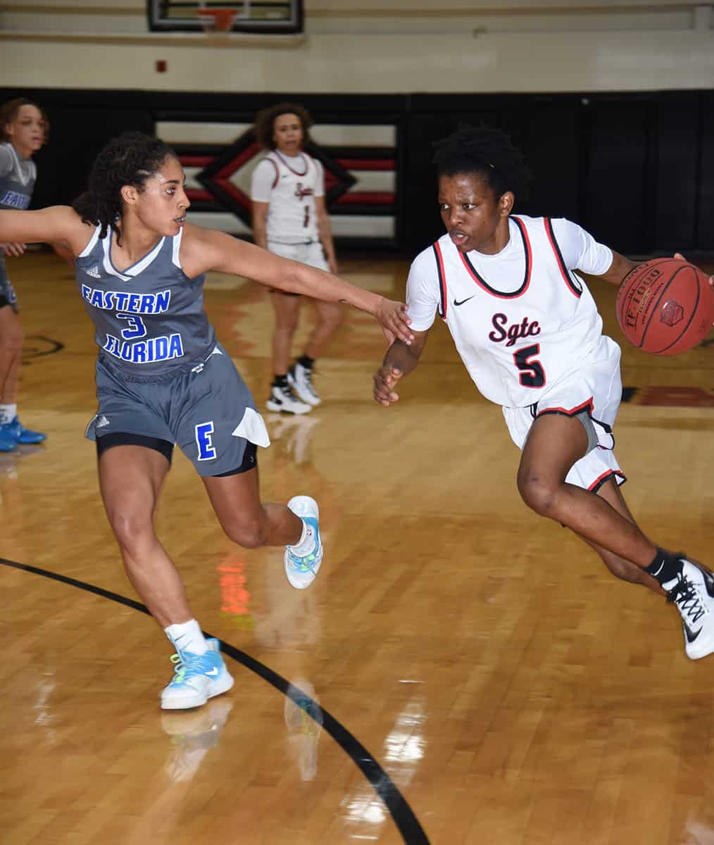 Amara Edeh, 5, is shown above driving to the basket. She led the Lady Jets in scoring with 15 points in a big win over Eastern Florida State in the Lady Jets Holiday Classic.