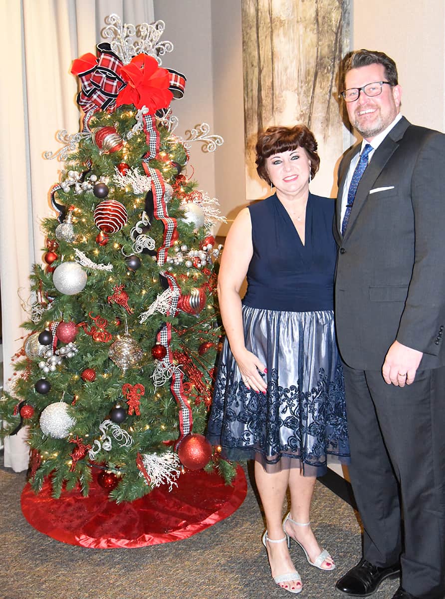 South Georgia Technical College President Dr. John Watford and his wife, Barbara, are shown above getting ready to welcome guests to the Christmas gala.