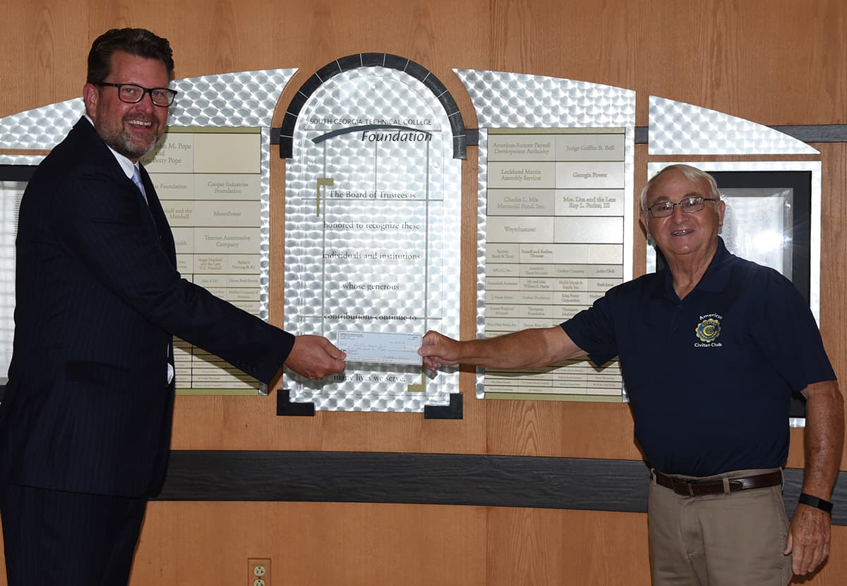 Americus Civitan Club President Dale Davis (right) is shown above presenting a check to South Georgia Technical College President Dr. John Watford (left) for the Americus Civitan Club’s endowed scholarship for nursing students at South Georgia Technical College.