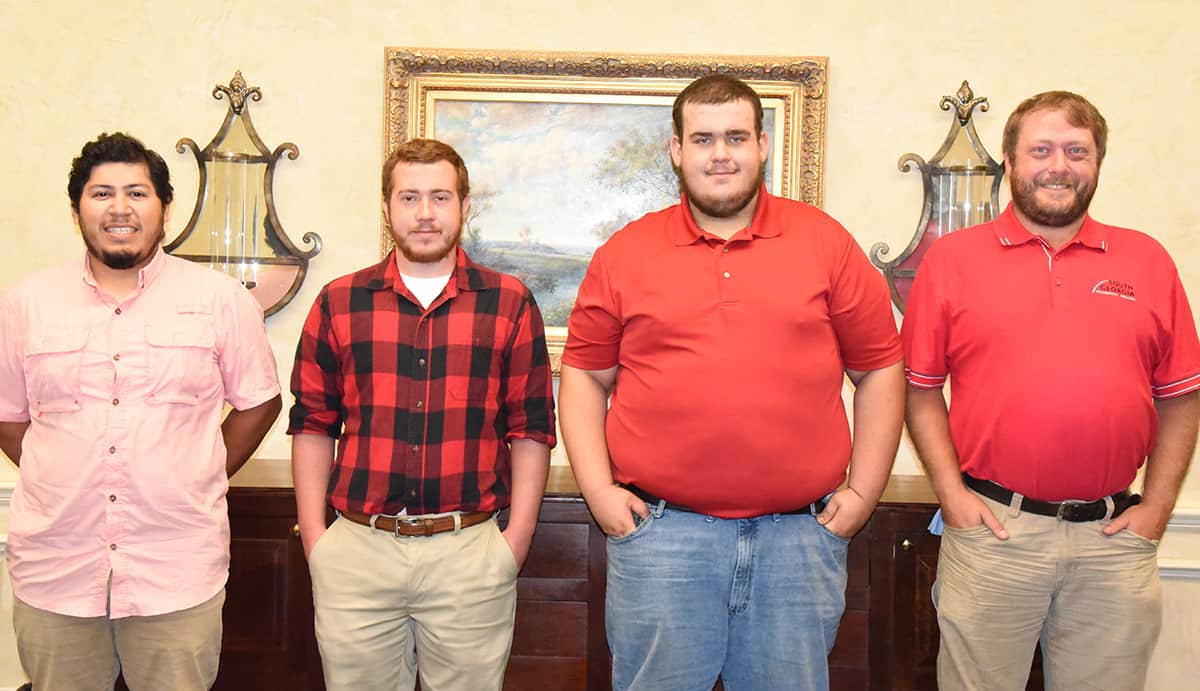 Shown above (l to r) are: SGTC Caterpillar Excellence scholarship winners Miguel Carranza, Jr., Tyler Long, and Richard Hardee with SGTC Diesel Equipment Technology instructor Chase Shannon.