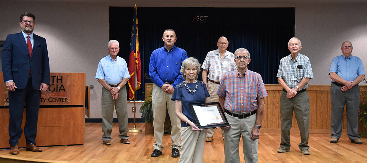Shown above with South Georgia Technical College President Dr. John Watford (far left) are the members of the Cordele Evening Lions Club organization that endowed a scholarship through the South Georgia Technical College Foundation for Crisp County students who enroll in the Law Enforcement Academy, Medical Assisting, or Criminal Justice programs. Shown with the endowed certificate are Mrs. Alton Churchwell, widow of long-time member Alton Churchwell, and Lions Club President Mac Hancock. Also shown are members Tommy Stephens, Scott Conn, Tommy Simmons, Sonny Dowell, and Earle Jones. Not shown is Bobby Benson.