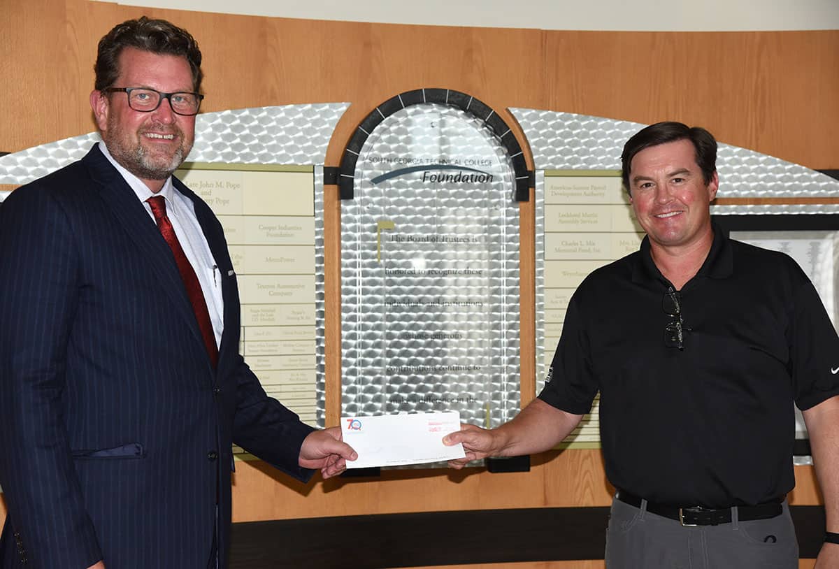 Kevin Reeves of Parker’s Heating and Air (r), is shown above presenting a donation to the SGTC Foundation. South Georgia Tech President Dr. John Watford (l) accepted the donation on behalf of the Foundation.