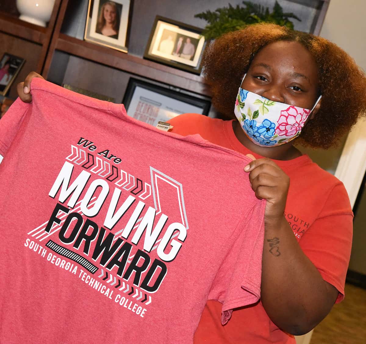 This student is “Moving Forward” Fall semester at South Georgia Technical College. She is proud to show off the new “Moving Forward” t-shirts that is available for students who register for Fall Semester classes while supplies last.