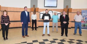 South Georgia Technical College President Dr. John Watford (second from left) is shown above presenting Michael Slade Dominick, Jr., of Plains with his Sumter EMC Electrical Lineworker Scholarship certificate. Also shown (l to r) are SGTC Economic Development Assistant Tami Blount, Dr. Watford, SGTC Lineworker Instructor Sidney Johnson, Scholarship winner Michael Slade Dominick, Jr., Lineworker Instructor Bobby Baxley, SGTC Economic Development Director Paul Farr and Lineworker Instructor Dewey Turner.