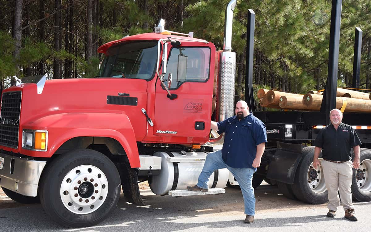 South Georgia Technical College Commercial Truck Driving Instructor Ken Hair (right) is shown above with David Harbort of Georgia Forest Products, Inc. in Americus, who enrolled in the program recently.