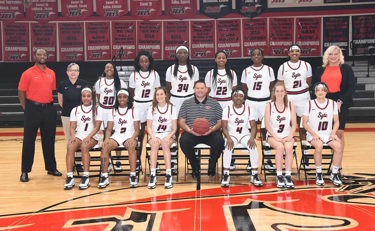 SGTC 2021 Lady Jets. Shown (l to r) standing are: Assistant Coach Demetrius Colson, Athletic Assistant Terri Battle, Kamya Hollingshed (30), Flore Ngasamputu (12), Femme Sikuzani (34), Sarah Lwambo (22), Tena Ikidi (15), Hope Butera (21), and Assistant Coach Ciarra Edwards. Shown sitting (l to r) are: Imani McNeal (1), Maikya Simmons (2), Jaidyn Trevino (14), Head Coach James Frey, Veronica Charles (4), Abby Solway (3), and Moe Shida (10).