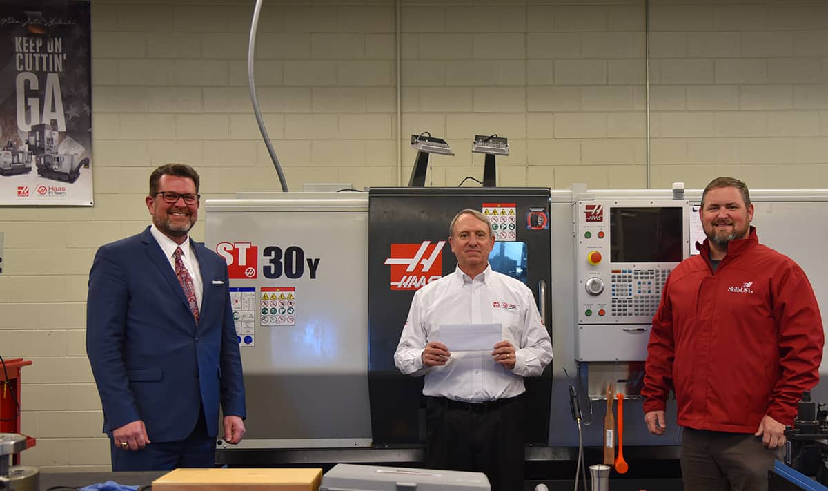 South Georgia Technical College President Dr. John Watford (left) is shown above accepting a check from David Aycock with (center) Gene Haas for the SGTC Precision Machining and Manufacturing Program. Chad Brown, SGTC Precision Machining and Manufacturing Instructor, (right) is also shown.
