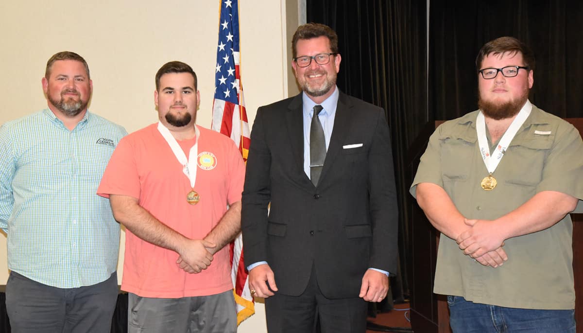 South Georgia Technical College President Dr. John Watford (second from right) is shown above with SGTC Precision Machining and Manufacturing Instructor Chad Brown and his two SkillsUSA Gold Medal Winners Tison Smith and Patrick Hortman. Smith and Hortman will now advance to the SkillsUSA National competitions.