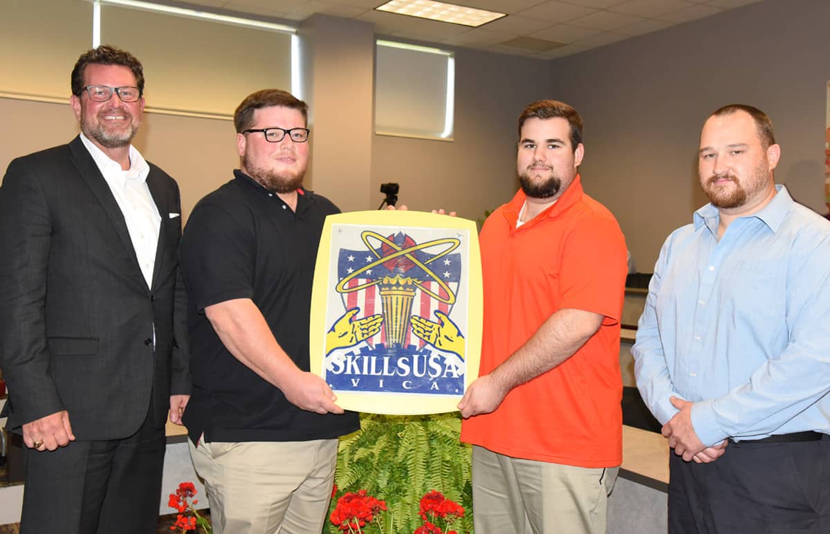 South Georgia Technical College President Dr. John Watford (l to r) is shown above with SGTC Precision Machining and Manufacturing students Patrick Hortman and Tison Smith who won Bronze Medals in the National SkillsUSA Additive Manufacturing competition and Jonathan Camp who was one of the top nine finalists nationally in the SkillsUSA Aviation Maintenance Technology competition.