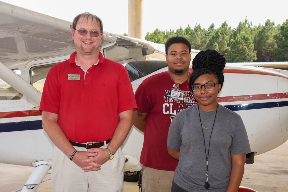 SGTC Aircraft Structural Technology program instructor Jason Wisham (l-r) and his former students Darryl Rumph, Junior and Riana Davis. Rumph and Davis both went to work for Thrush Aircraft graduating from SGTC.