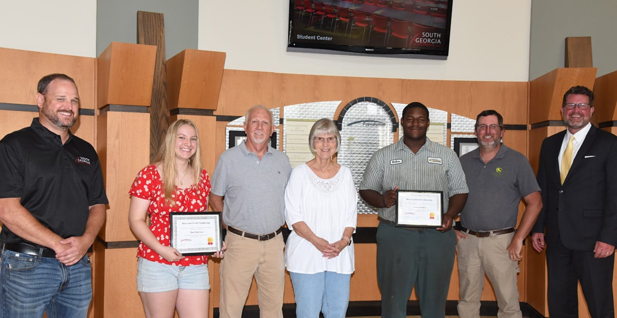 South Georgia Technical College President Dr. John Watford (right) is shown above with Jake and Margie Everett and the new recipients of the Rose Ann Everett Scholarships, Mae Morrison and Joshua Walker. Shown (l to r) are South Georgia Technical College welding instructor Ted Eschmann, Rose Ann Everett Scholarship winner and welding student Mae Morrison, Jake and Margie Everett, SGTC John Deere Tech student and Rose Ann Everett scholarship winner Joshua Walker with his John Deere Tech instructor Matthew Burks.