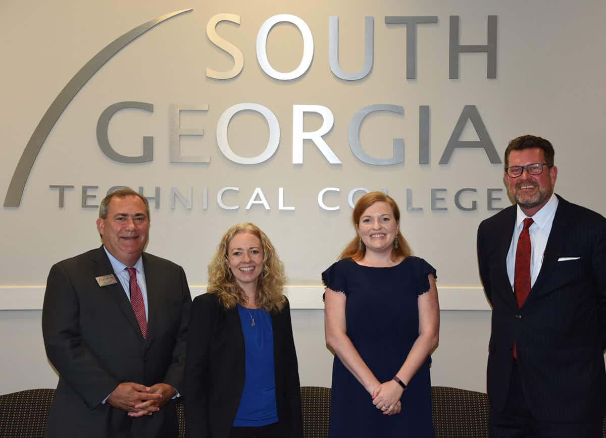 South Georgia Technical College President Dr. John Watford is shown above standing (r) with SGTC Business and Industry Services Director Paul Farr (l to r) along with Jefferson State Community College Associate Dean for Technical Programs Deana Goodwine and Jefferson State Director of Workforce Education Lean Bigbee. Not shown is SGTC Vice President of Institutional Advancement Su Ann Bird.