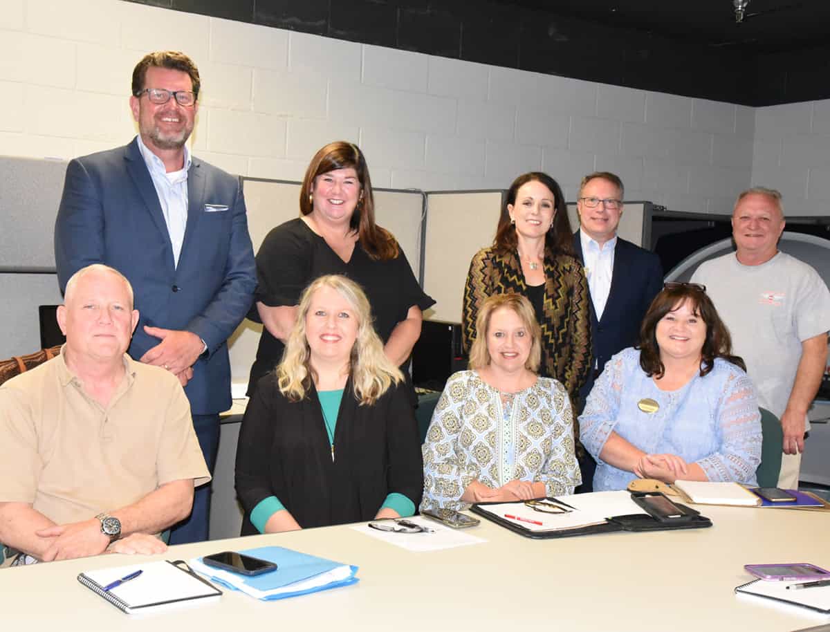 South Georgia Technical College President Dr. John Watford is shown above standing (l to r) with Wiregrass Technical College Executive Director for Academic Affairs Niki Ogletree, Executive Director for Fundraising Crissy Staley, SGTC Vice President of Academic Affairs David Kuipers, and SGTC Aviation Maintenance Technology Instructor Charles Christmas. Shown seated (l to r) are SGTC Aviation Maintenance Instructor David Grant, Wiregrass Technical College Interim Vice President of Academic Affairs April McDuffie, Wiregrass Associate Vice President for Workforce Development Brandy Wilkes, and Wiregrass Interim President DeAnnia Clements.