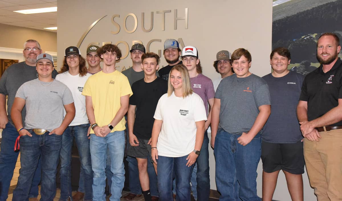 South Georgia Technical College alumnus Danny Hale (shown above right on the back row) is shown above with the group of students that he brought to take a tour of South Georgia Technical College recently.
