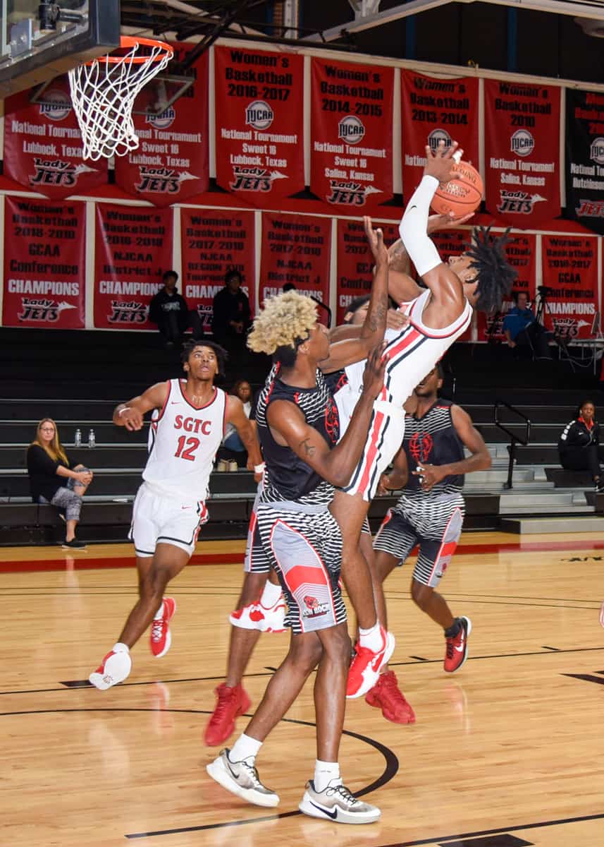 SGTC’s Marvin McGhee gets off a contested shot in the Jets’ victory of New Rock Prep.