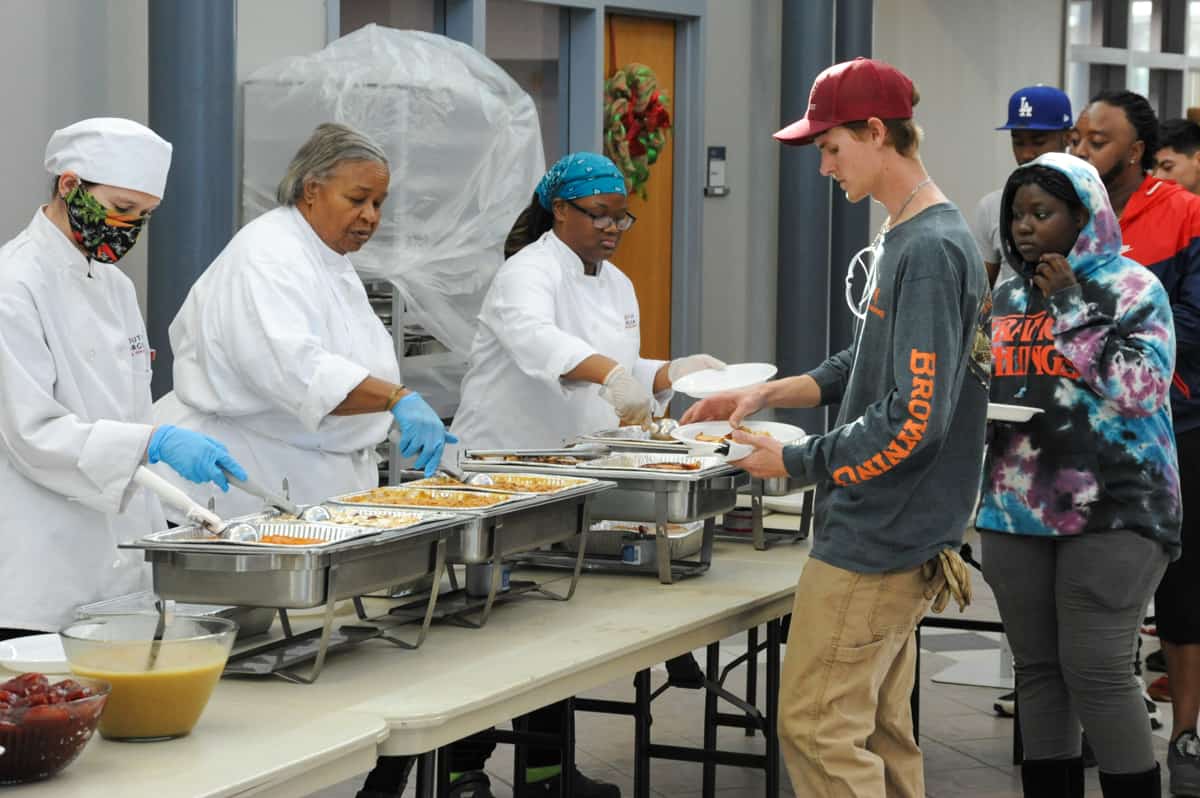 South Georgia Technical College Culinary Arts students serve a traditional thanksgiving meal to fellow students at the SGTC Crisp County Center in Cordele.