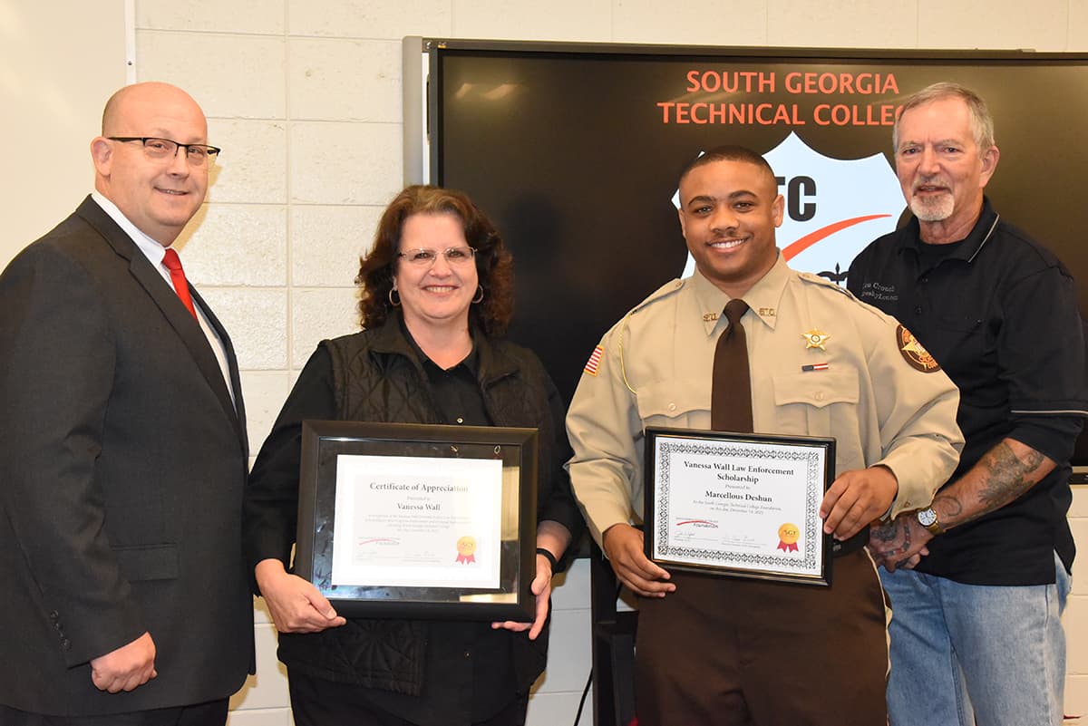 SGTC Law Enforcement Academy Director Brett Murray is shown above with Chief Vanessa Wall and Marcellous Deshun as she presented Deshun with the initial Chief Vanessa Wall Criminal Justice/Law Enforcement scholarship. Also shown is Lou Crouch who endowed the scholarship.