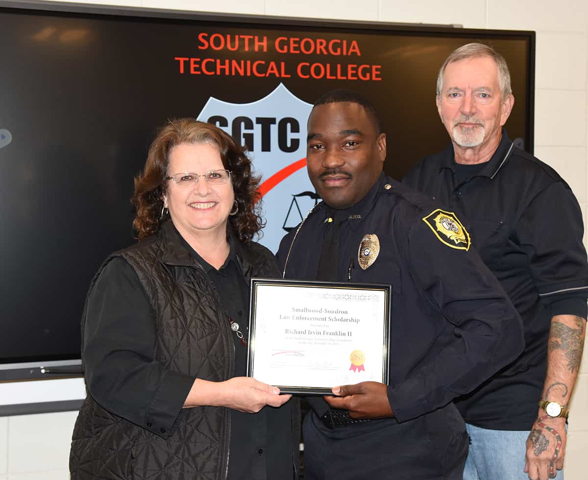South Georgia Technical College Assistant Vice President of Student Affairs and Law Enforcement Academy Instructor Chief Vanessa Wall (left) is shown above congratulating Richard Franklin (center) for receiving the Smallwood – Sondron Law Enforcement Academy Scholarship. Lou Crouch is also shown above (right).