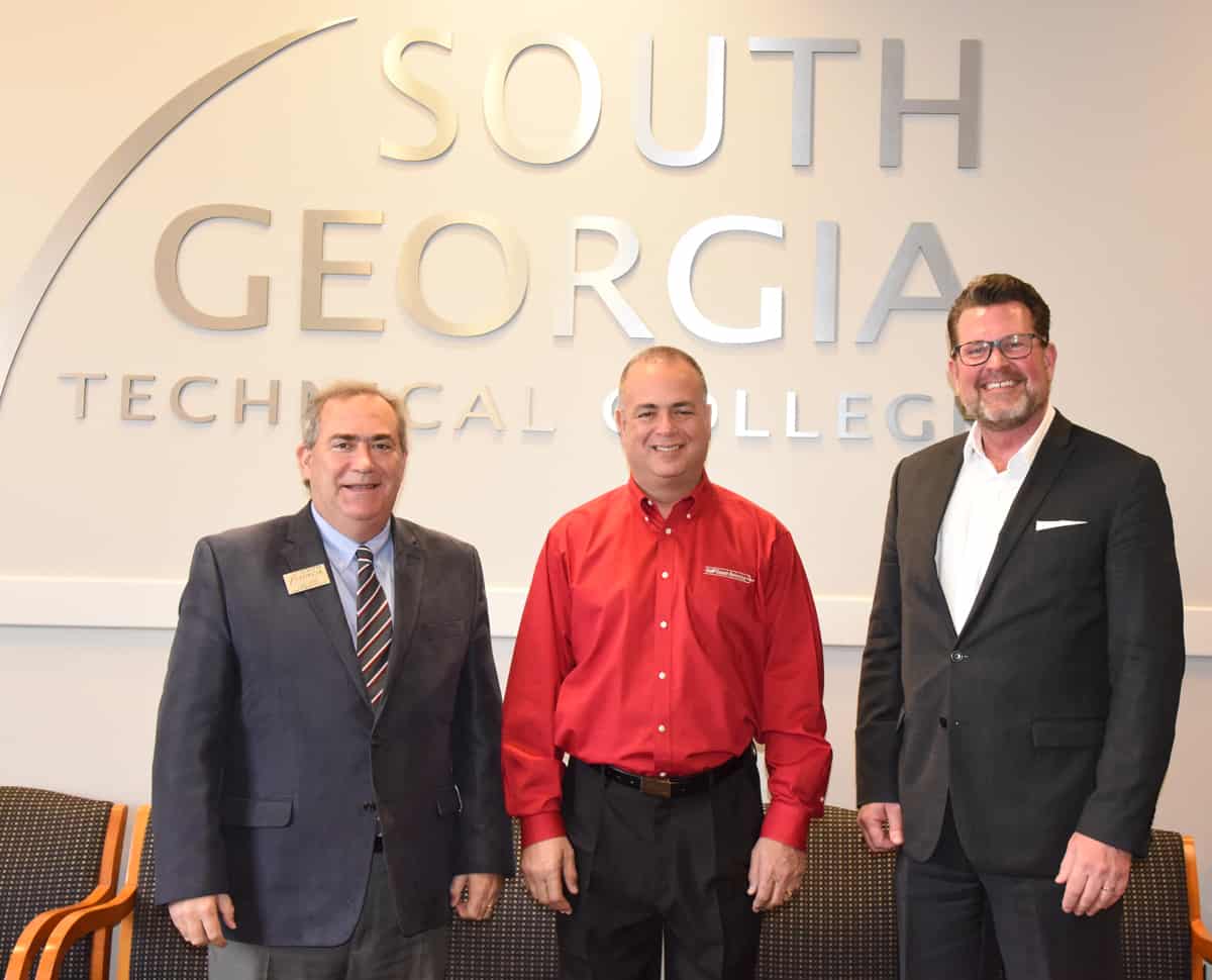South Georgia Technical College President Dr. John Watford is shown above (r) with Rick Garcia of Gulf Coast Avionics (center) and SGTC Director of Business and Industry Services after the tour of the Americus campus.