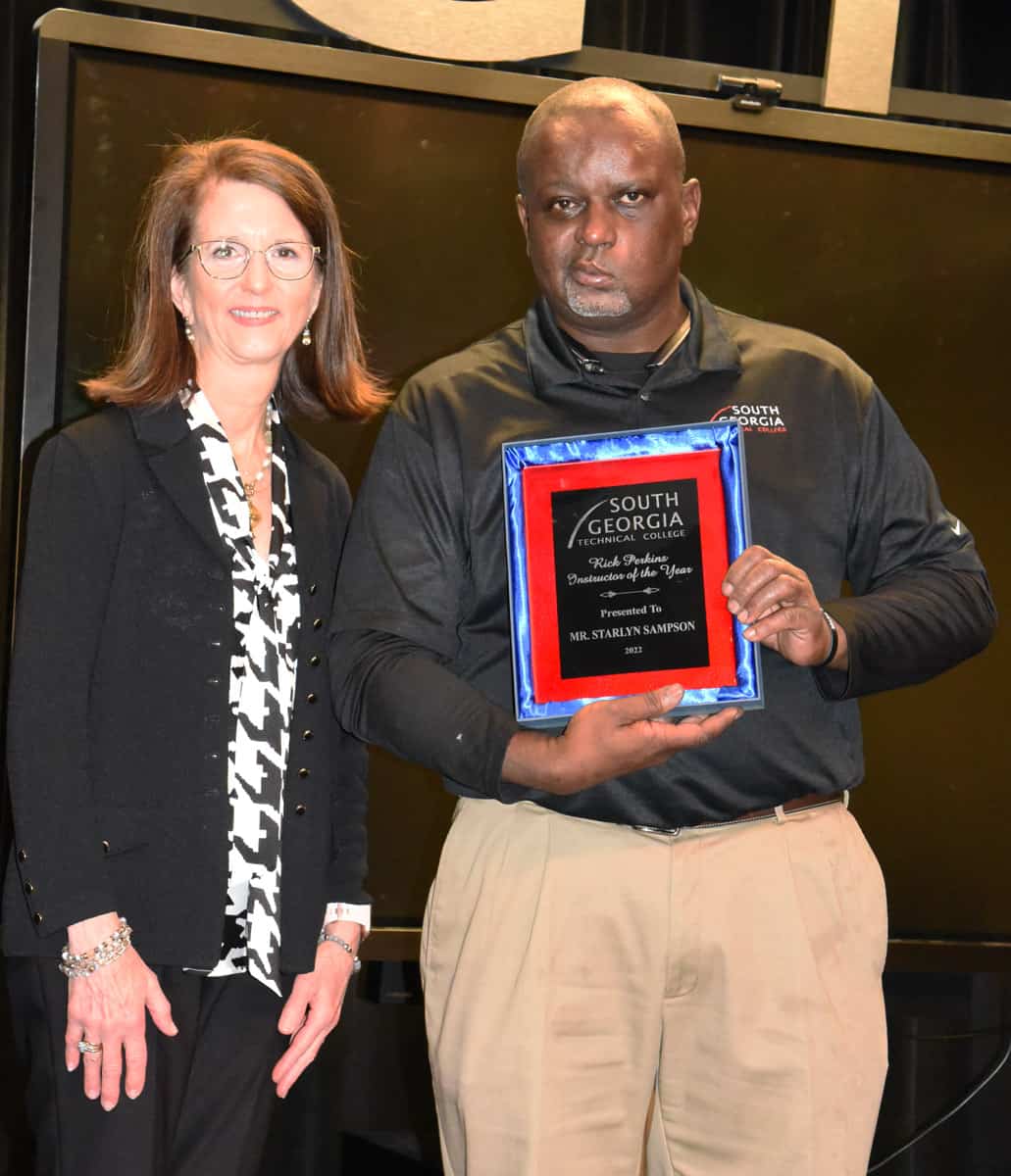 Synovus’ Tami Duke is shown above (l to r) presenting Starlyn Sampson with a donation from Synovus for being selected as the South Georgia Technical College 2022 Rick Perkins Instructor of the Year.