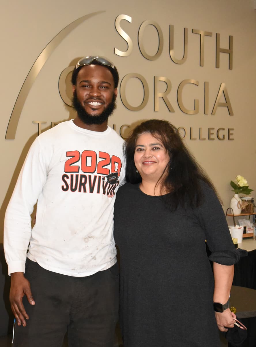 SGTC WIOA Coordinator Sandhya Muljibhai is shown above with graduate Terrellis Lamar, who is now employed with Big Tex Trailers in Cordele as a welder.