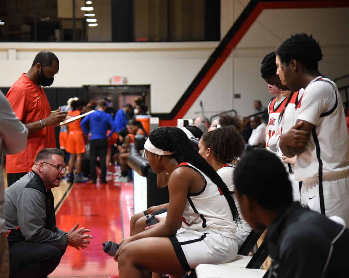 SGTC head coach James Frey is shown above talking with the Lady Jets during a timeout against Georgia Highlands.
