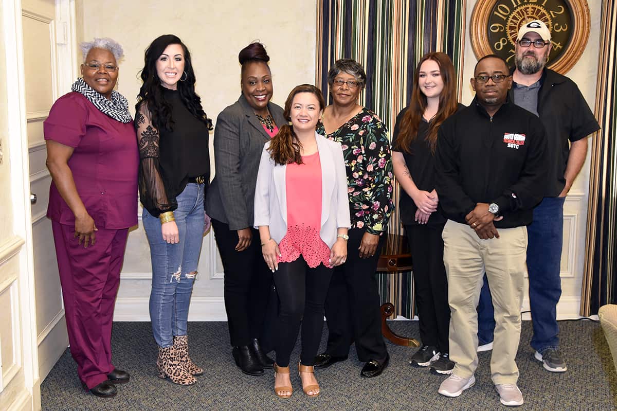 Members of SGTC staff and the Cosmetology Advisory Council (l-r): Dorothea Lusane-McKenzie, Cosmetology Instructor; Tori Purvis, Owner/Stylist at Capelli Salon and Spa in Albany; Kembrial Harris of Kem’s Beauty Palace of Montezuma; Samantha Inthiraj Nquyen of Sally’s Nail and Spa in Americus and Ellaville; Martha Bruce of KB’s Beauty Salon; SGTC Cosmetology student Anna Rees; Barbering instructor Andre Robinson; and SGTC Barbering Student Brandon Price. Not pictured is council member Tracy Finch of Dorothea’s Beauty Salon.