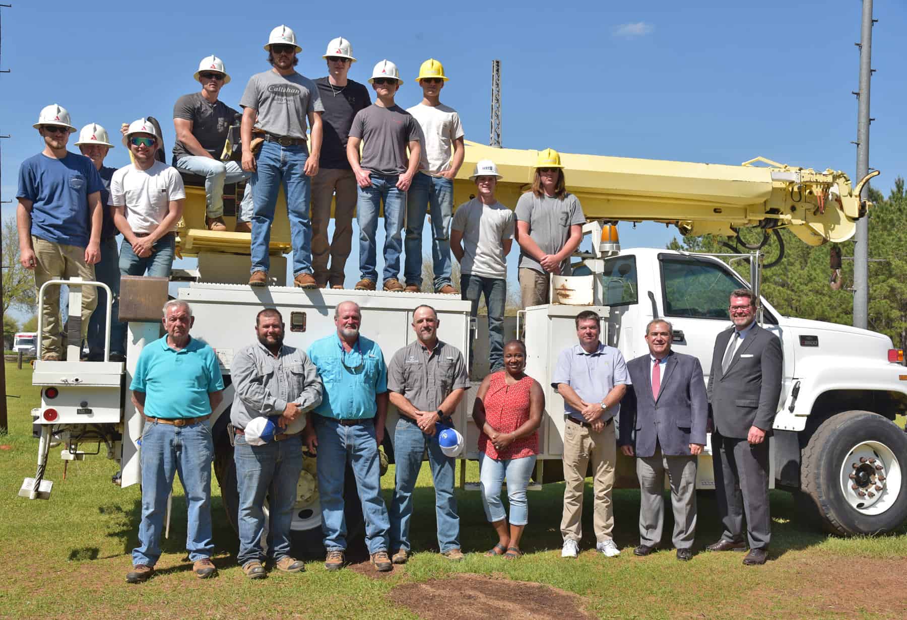 The Crisp County Power Commission donated a 2000 GMC 8500 Digger Derrick truck to the South Georgia Technical College Foundation recently to be used in the college’s Electrical Lineworker program. Shown above (l to r) in front of the truck are: SGTC Electrical Lineworker Instructor Dewey Turner, Crisp County Power Commission Mechanic Trey McBryant, SGTC Instructor Harold Ergle, Crisp County Power’s Manager of Operations Blake Manning, Director of HR Ladreka Daniels, and Chairman Ray Hughes with SGTC President Dr. John Watford and SGTC Economic Development Business and Industry Director Paul Farr. Members of the 2022 Electrical Lineworker program are also shown on the truck.