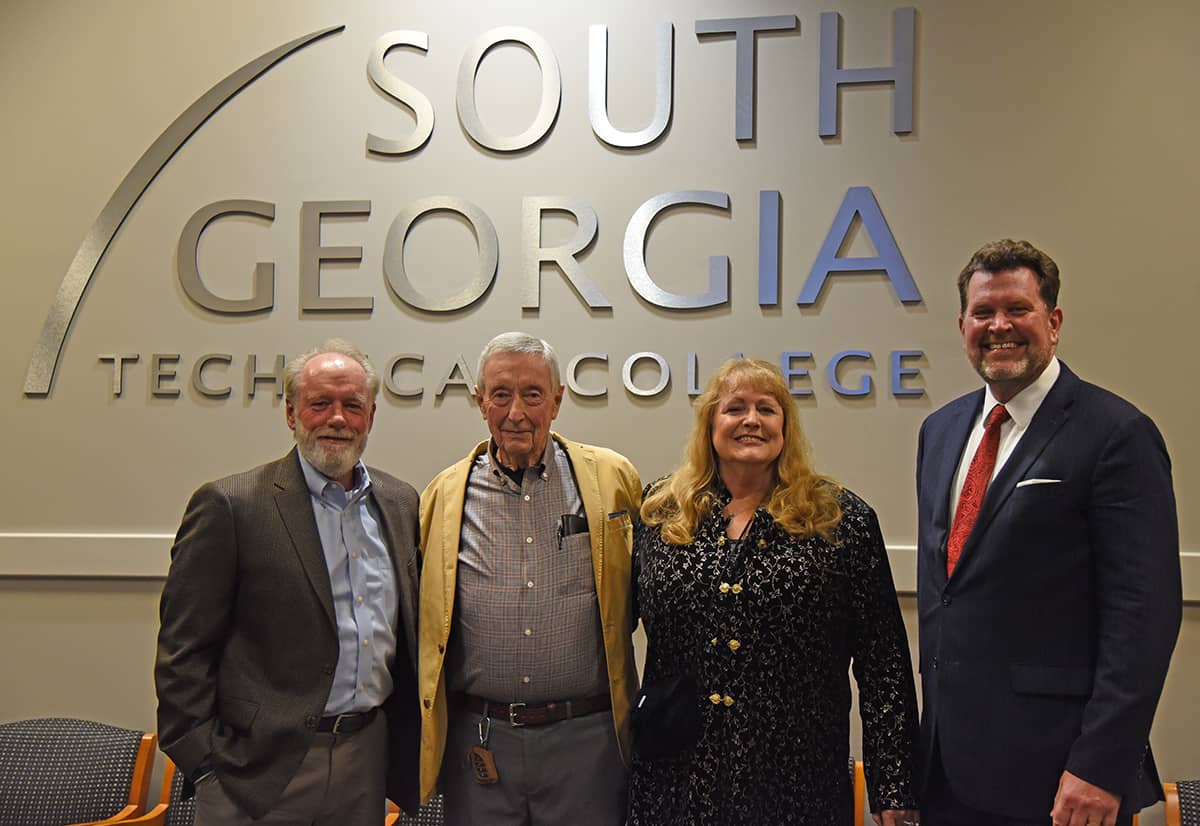 Frank Gassett, second from left, is shown above with two of his former graduates, Dan Linginfelter and Dr. Royce Ann Martin, as well as SGTC President Dr. John Watford. Linginfelter and Martin both retired after tremendous careers in the aviation maintenance field. Linginfelter who is now Chairman of the Technical College System of Georgia State Foundation Board and former TCSG Alumnus of the Year, retired from Delta Air Lines as the Atlanta Station Manager, International. He also recently retired from Gulf Stream and worked with Certified Aviation Services. Dr. Royce Ann Martin was South Georgia Tech’s GOAL (Georgia Occupational Award of Leadership) student and the State goal winner in 1981. She also received the state’s PRIDE (Performance Recognition Indicating Demonstrated Excellence) Award. She graduated from SGTC, she worked for Grumman Aircraft as a civilian ground instructor. She went back to college and earned her Master’s degree and later her Ph.D. She taught aviation courses at Indiana State University for five year and retired in Bowling Green, Ohio from the College of Technology at BGSU, teaching aviation courses there for nearly 22 years.
