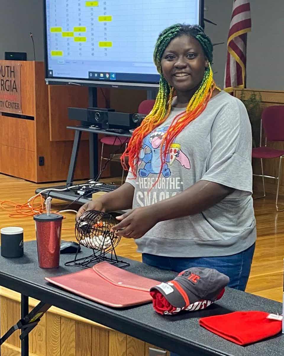 Criminal Justice Student Amaya Brown of Pineview facilitates a game of BINGO at the recent “Spring Fling” event at the SGTC Crisp County Center. The SGTC Student Government Association sponsored the event for students, faculty, and staff.