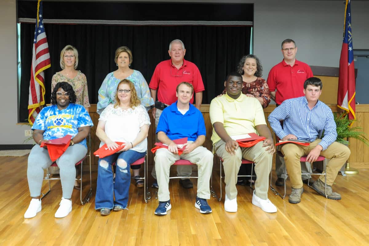 Standing (l-r): Julie Partain, SGTC Dean of Enrollment Management; Carol Cowan, Medical Assisting instructor; Mike Enfinger, HVAC and Electrical Systems instructor; Brandy Nipper, Practical Nursing instructor; and Brad Aldridge, Welding instructor. Seated (l-r): SGTC Student of Excellence nominees Valerie Barber, Shana Jolly, Gregory Bacon, Ladarius Smith, and overall winner Elijah Harris. Not pictured is nominee Cody Gillis.