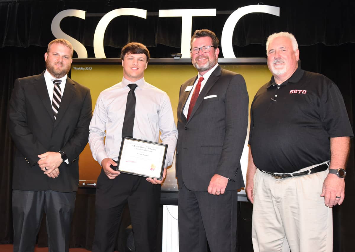 Shown above with Peyton Norris (second from left), the Thompson Tractor CAT student who was awarded the 2022 Adrian “Goose” Johnson tool scholarship are SGTC Caterpillar Think Big Instructor Kyle Hartsfield, SGTC President Dr. John Watford, and SGTC CAT Think Big Instructor Don Rountree.