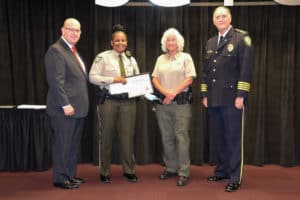 South Georgia Technical College Law Enforcement Academy Director Brett Murray is shown above with Smarr-Smith Scholarship recipient Alicia Colwell of Albany, who works at the Sumter County Sheriff’s office. Also shown are Jody Smith’s mother, Sharon Johnson and Americus Police Chief Mark Scott of the Smarr-Smith Foundation.