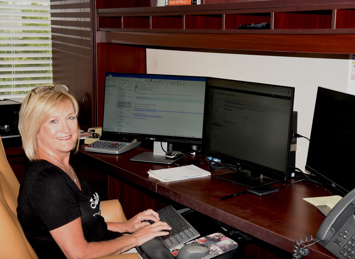 SGTC IT Director Dianne Trueblood, who is retiring June 1, 2022, is shown above at her computer.